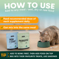 Cat eating from a bowl with Petz Park cat food supplement packages on a table.