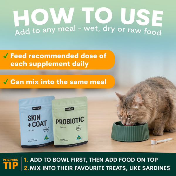 Cat eating from a bowl with Petz Park cat food supplement packages on a table.