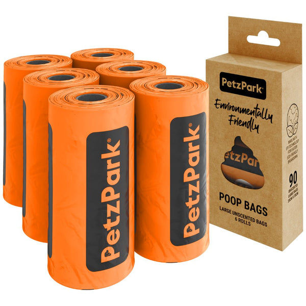 Orange rolls of Petz Park cat poop bags with a cardboard box packaging on a white background