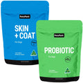 Two dog supplement bags from Petz Park, one labeled 'PROBIOTIC' and the other 'SKIN + COAT', designed for dogs. Both bags are blue with the brand name and product information printed on them.