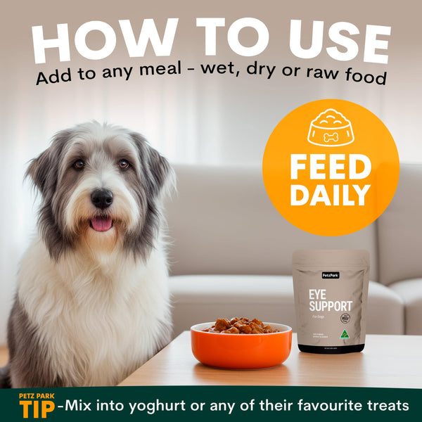 Dog with a bowl of food and a package labeled 'Eye Support' on a table, with text on how to use the product.